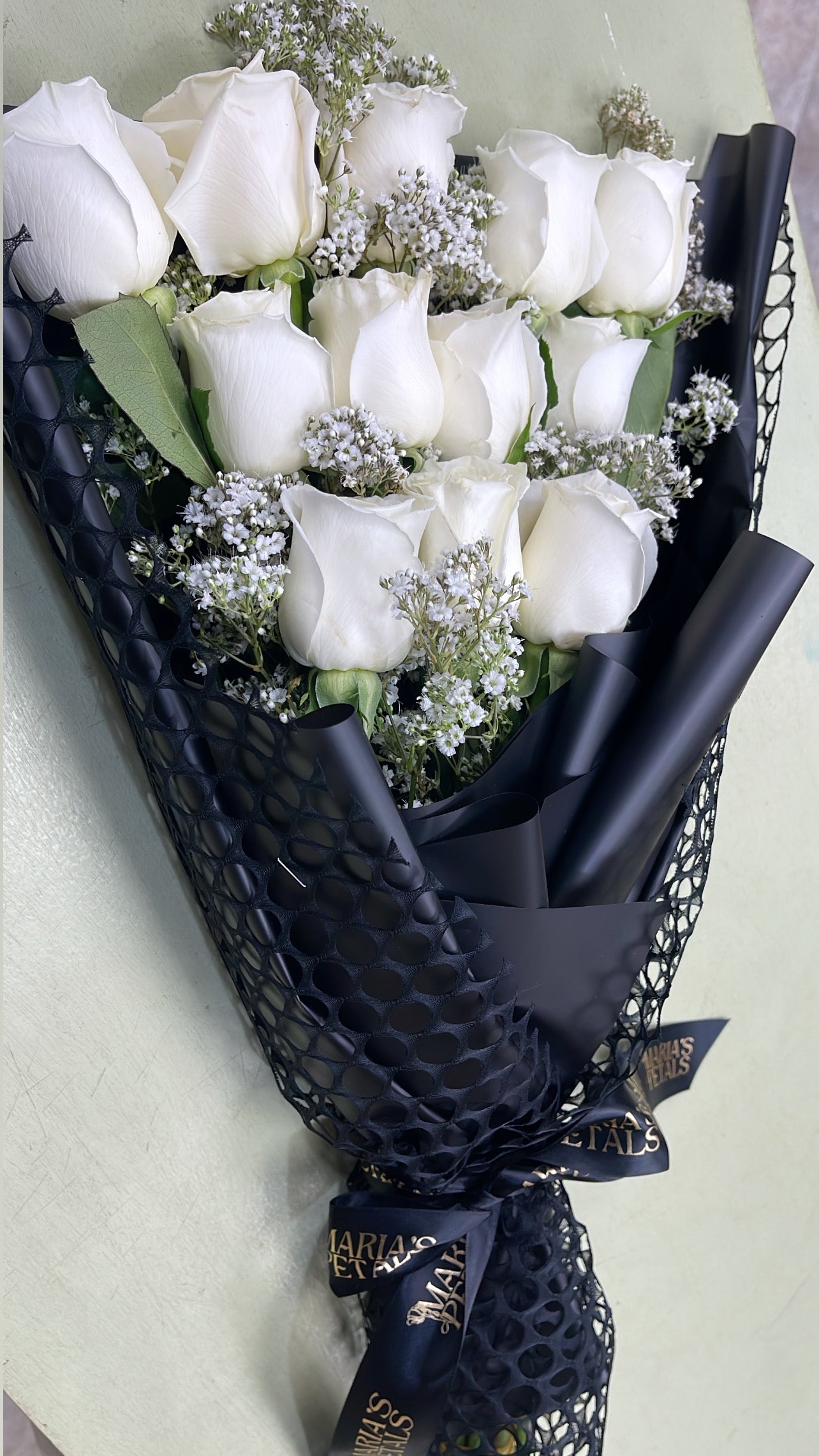 MP Signature Flat Lay Wrapped Roses